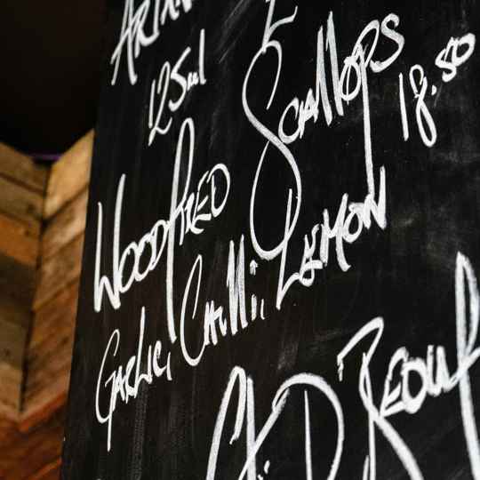 Guests dining at Daffodil Mulligan restaurant in Shoreditch, London.