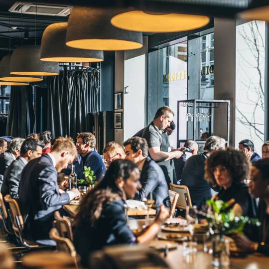 People dining at Daffodil Mulligan restaurant in Shoreditch, London